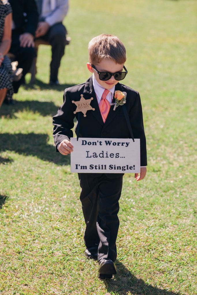 Don't worry ladies I am still available sign carried by a very handsome dude.