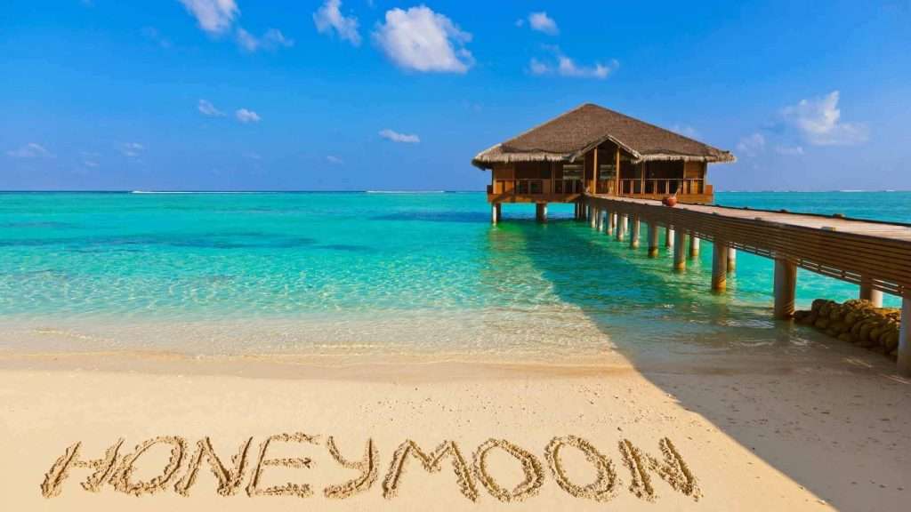 honeymoon-beach-sand-overwater-bungalow